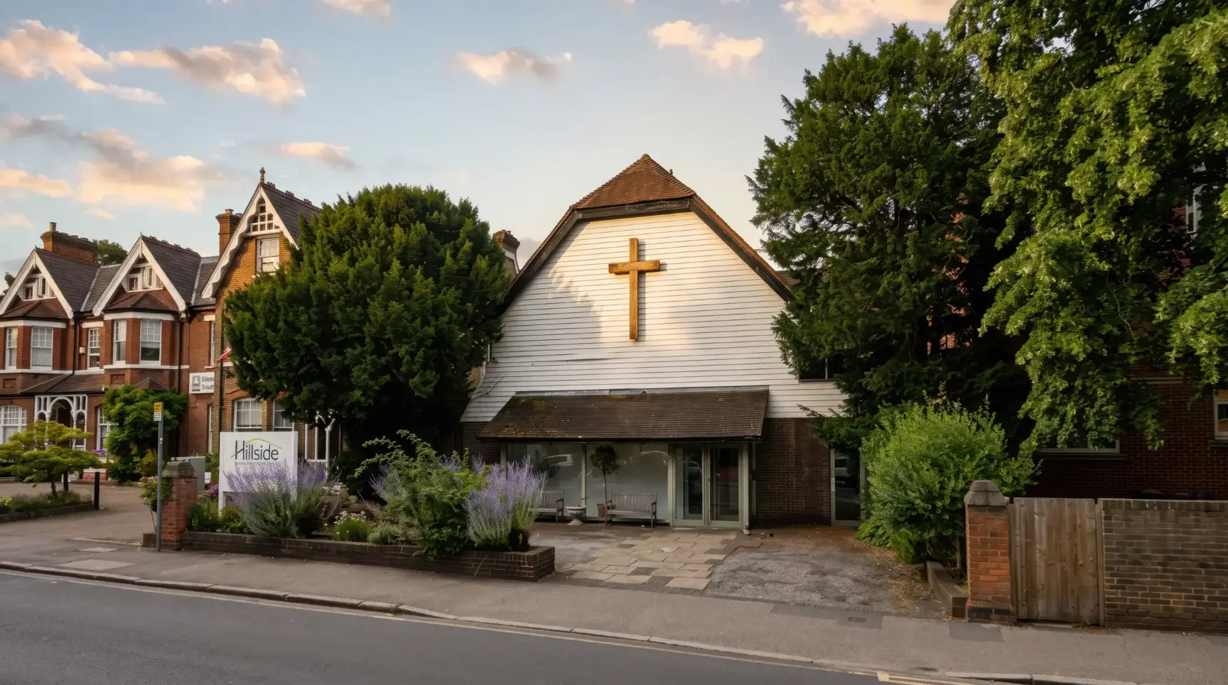 Hillside Church on Worple Road, its white gable and timber cross above the entrance